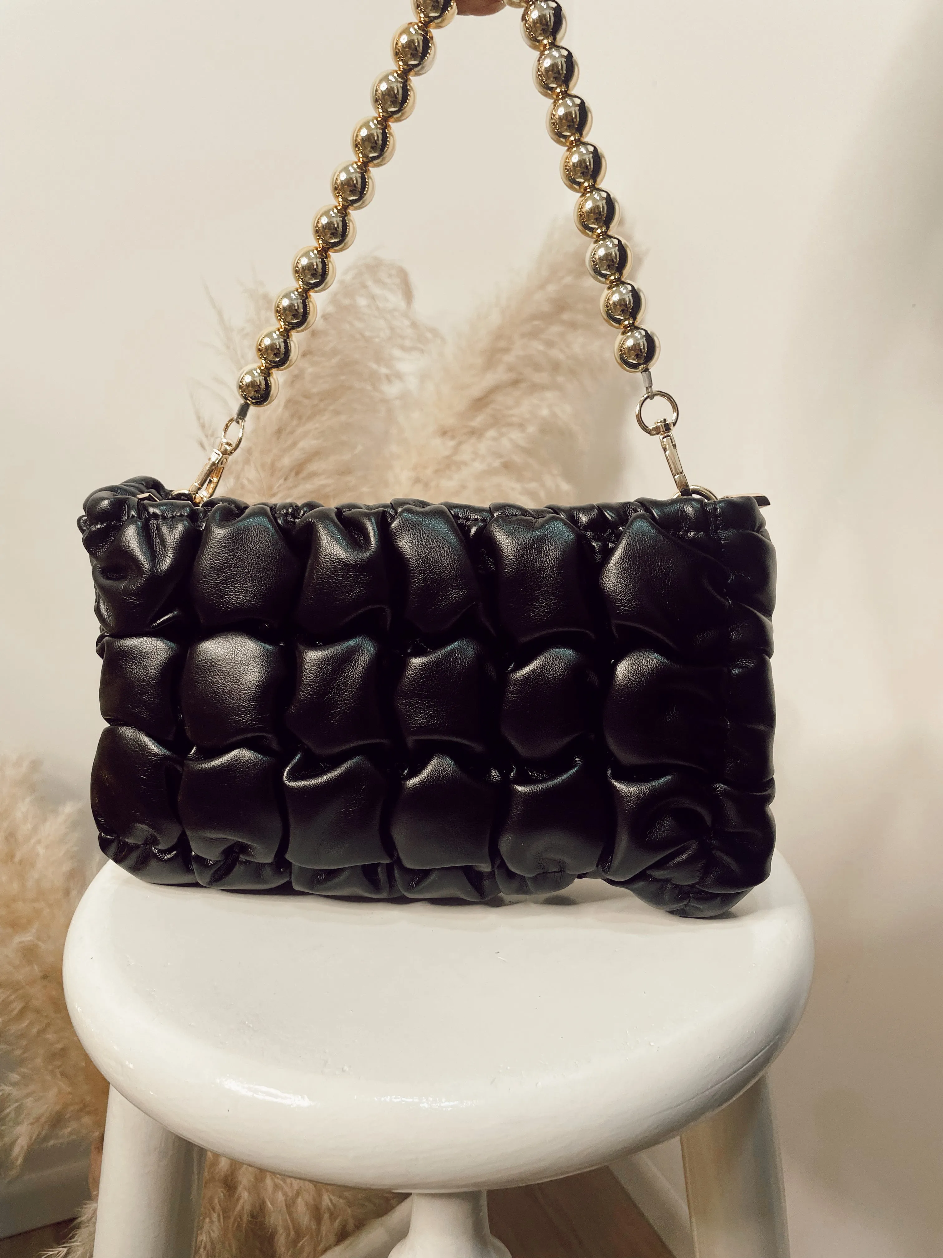 Bolso acolchonado