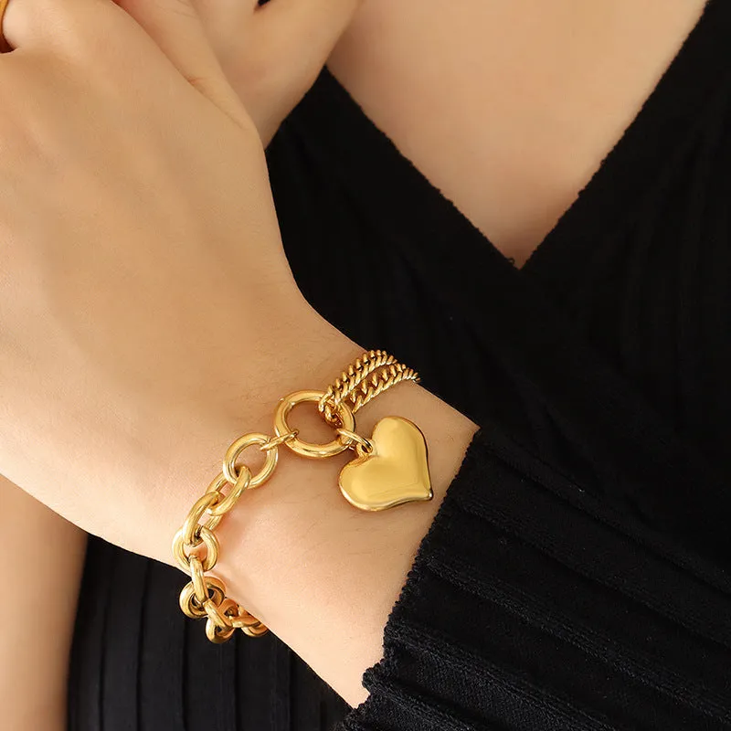 Pulseras de acero de titanio con forma de corazón de moda